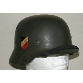 Double decal German army steel helmet M35 with the remains of camouflage. Espenlaub militaria